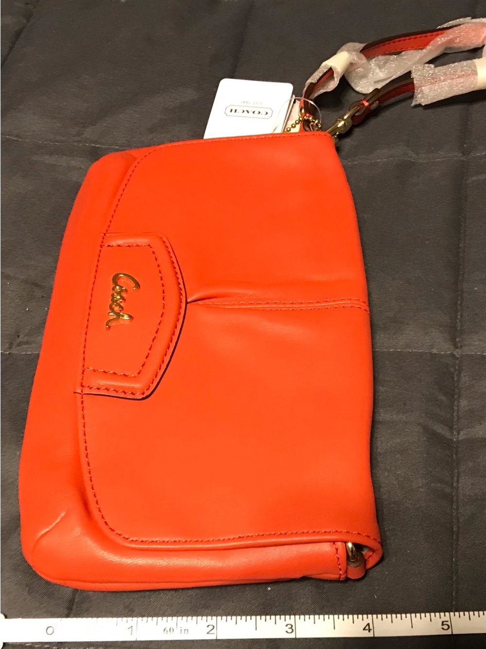 Coach Bright Orange Leather Wristlet Clutch with Gold Hardware